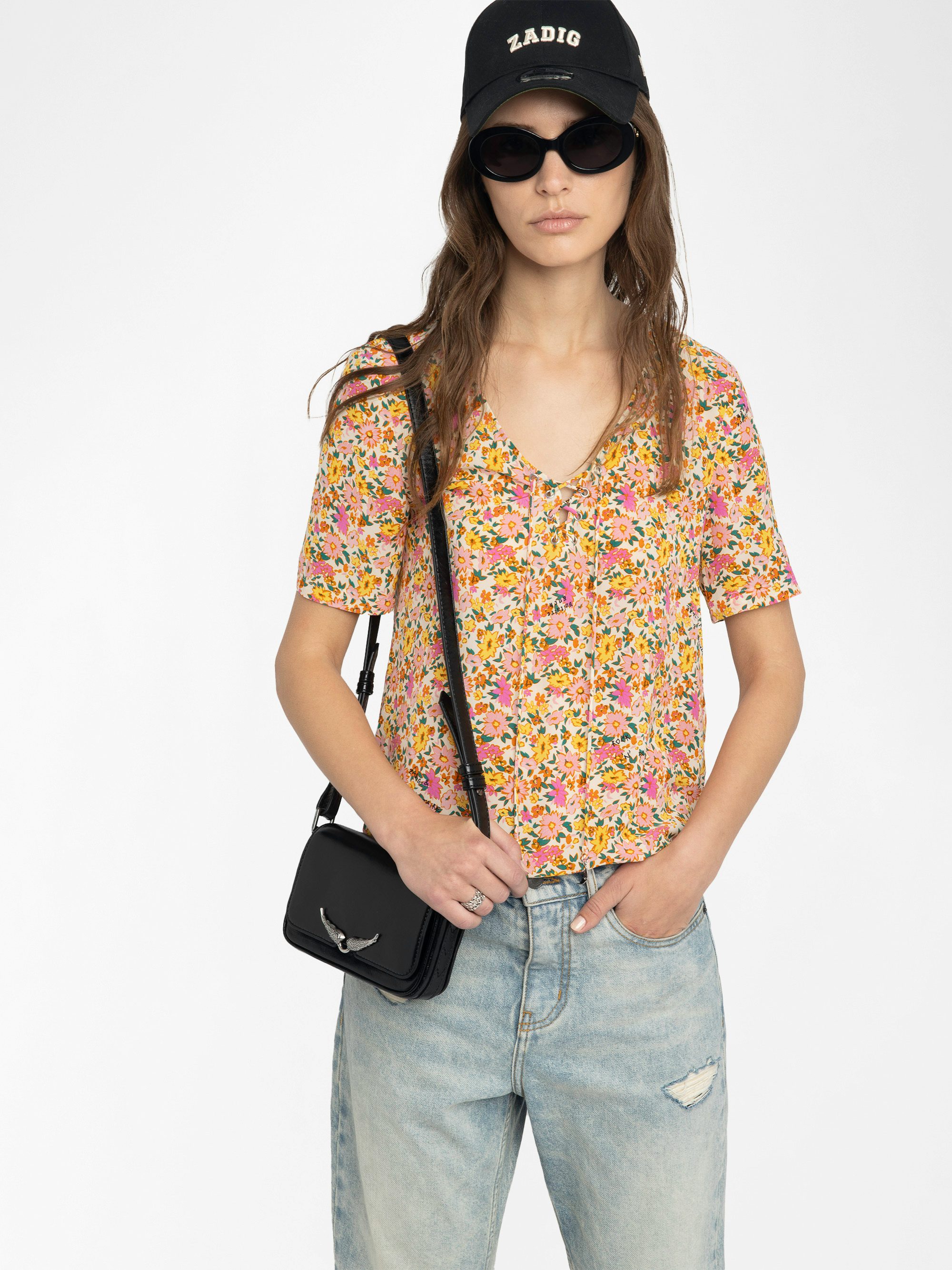 Terzo Top - Printed viscose top with laced neckline, metal wings and short sleeves.